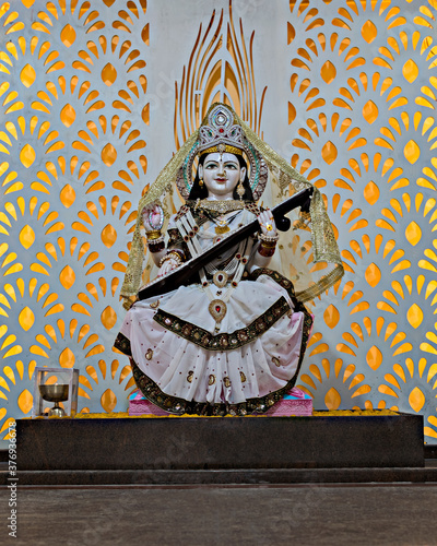 Isolated idol of Hindu Goddess Saraswati in a temple at Yavatmal, India. photo