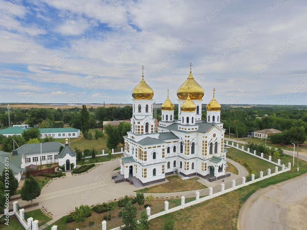 Church of the Holy Trinity in the village of Novodonetskaya with clouds, Krasnodar region, Russia