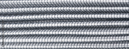 close-up of an air filter with a metal braid for a car