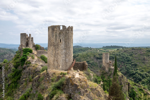Ruins of four medieval cathar castles Lastours in the mountain valley of Pyrenees, France