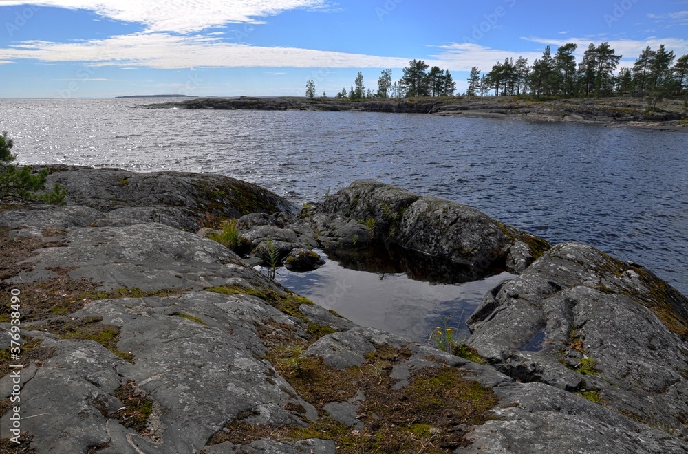 natural pool in stone rock. Ladoga lake bay Skerry in Rusian Karelia. Islands