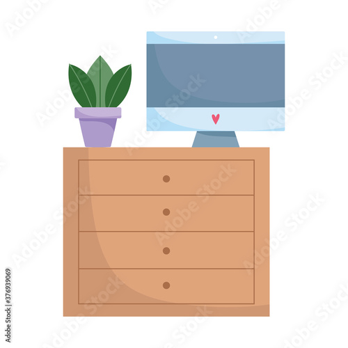 workspace screen potted plant on drawers white background