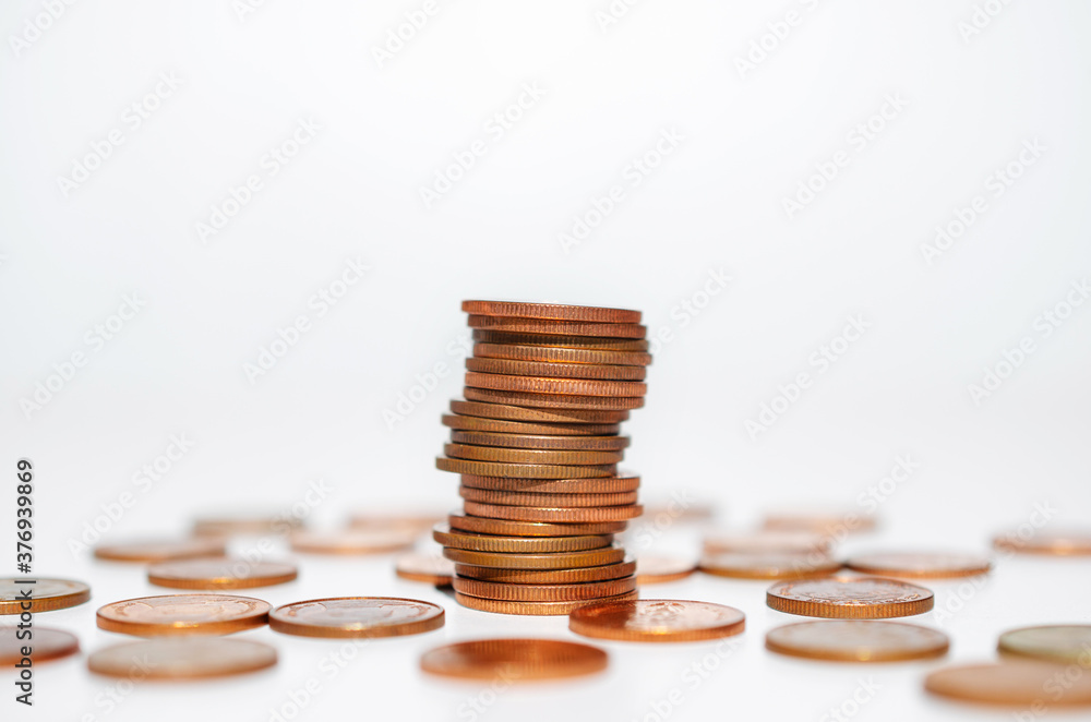 copper coin stack row growing pile on white background for money saving and investment business financial and banking concept. copper coin stack row growing pile on white background for money saving and investment business financial and banking concept.