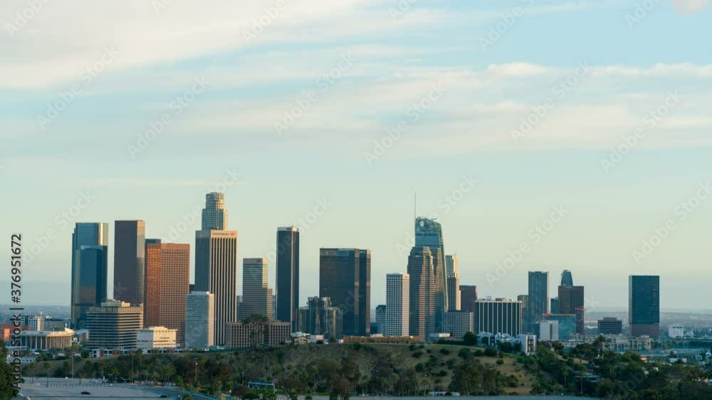Timelapse day to night shot of downtown Los Angeles skyline from sunset to night time Timelapse day to night shot of downtown Los Angeles skyline from sunset to night time