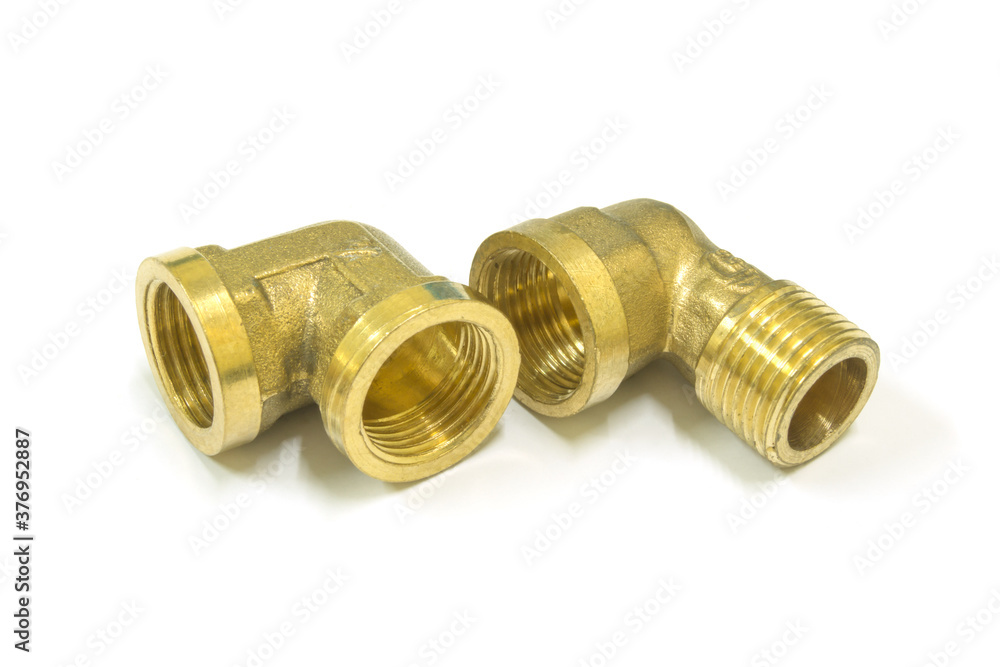 90 Degree brass elbow fitting on white background, Isolated. 90 Degree brass elbow fitting on white background, Isolated.