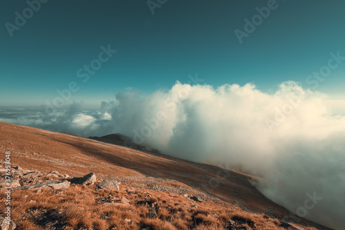 Amazing clouds landscape on the mountain in autumn season 