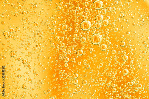 Wallpaper Mural Yellow and orange bubbles, drops of oil in water, olive oil for cooking background.  Torontodigital.ca