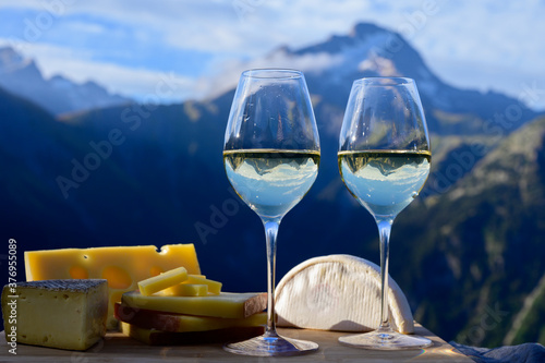 Canvas Print Tasty cheese and wine from Savoy region in France, beaufort, abondance, emmental