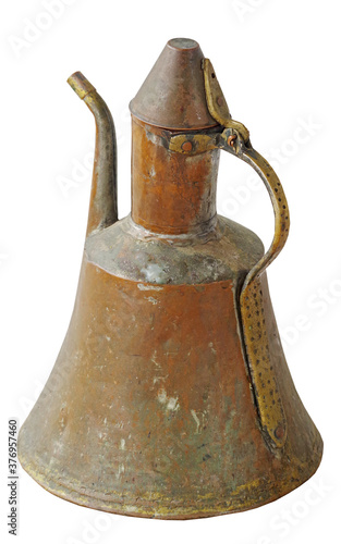 old brass kettle on white