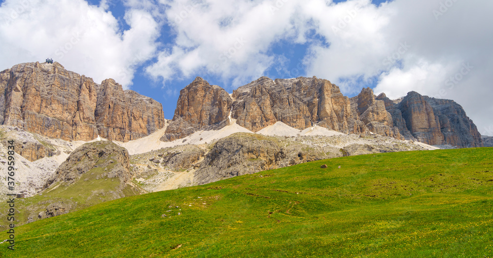 Mountain landscape along the road to Pordoi pass, Dolomites Mountain landscape along the road to Pordoi pass, Dolomites
