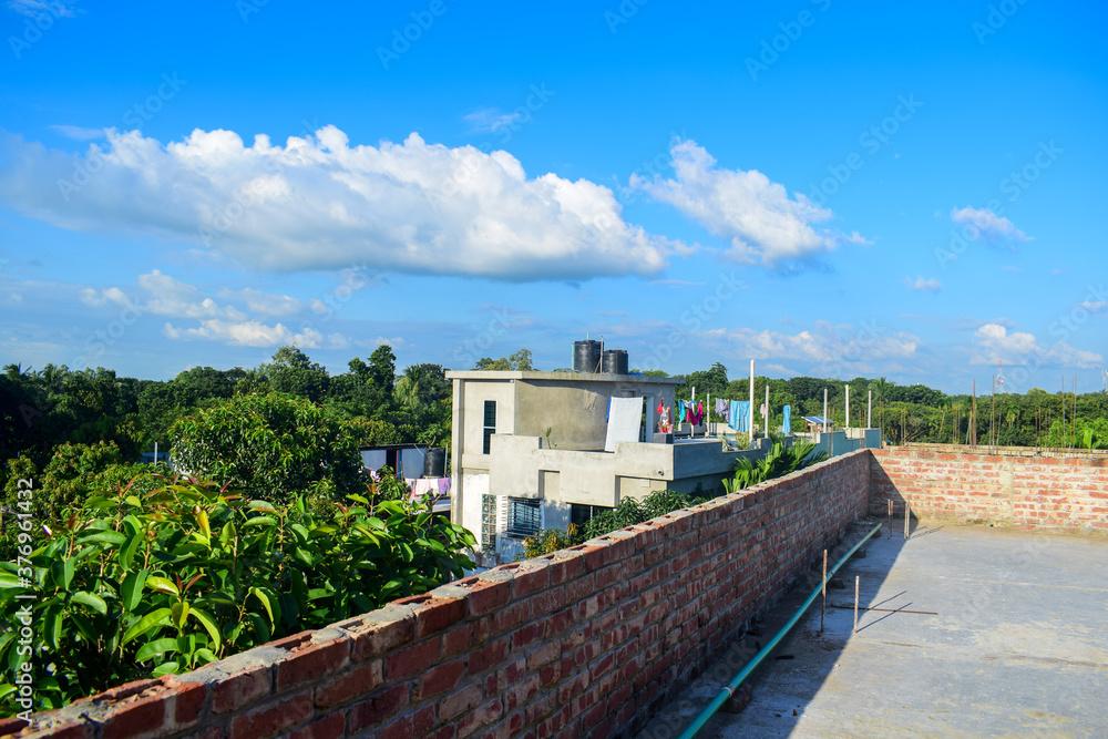 Rooftop of a building with Beautiful sky and clouds