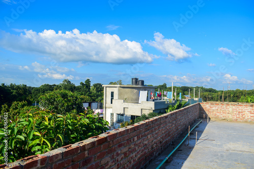 Rooftop of a building with Beautiful sky and clouds