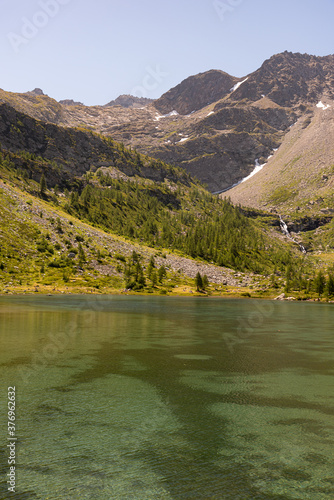 фотографія Morgex (Aosta), the wonderful Lake of Arpy, a mirror of water of glacial origin set in a beautiful alpine setting
