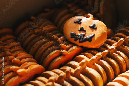 Pumpkin gingerbreads for the celebration of Halloween. photo