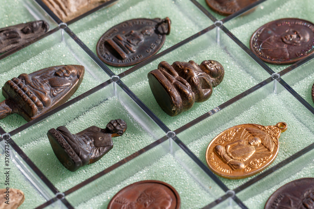 Small Buddha image or Thai amulet