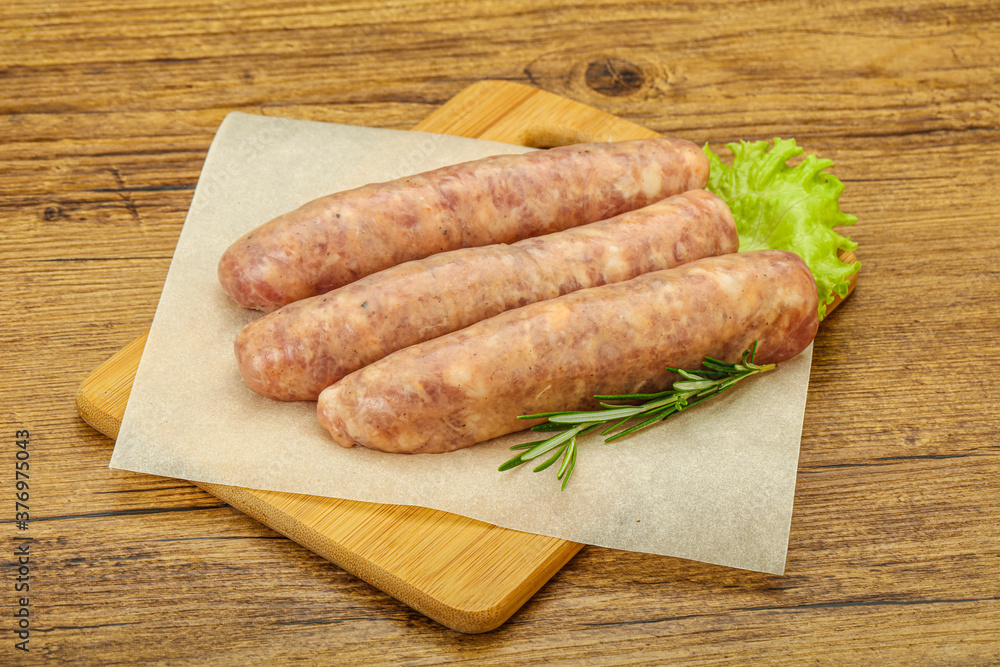 Raw pork meat sausages for grill Raw pork meat sausages for grill
