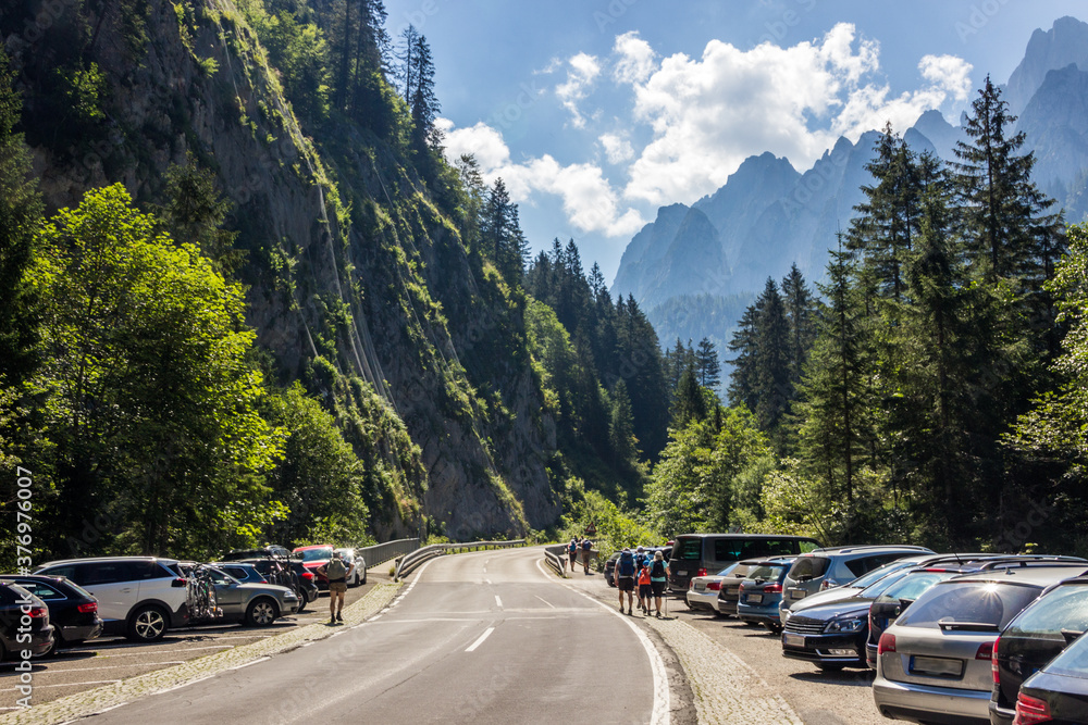 road in the austrian alps on a sunny day