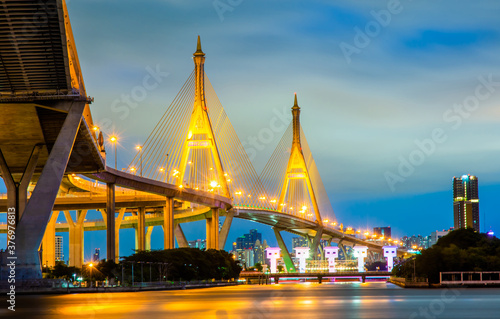Bhumibol Bridge across the Chao Phraya River Blur night lights Thailand