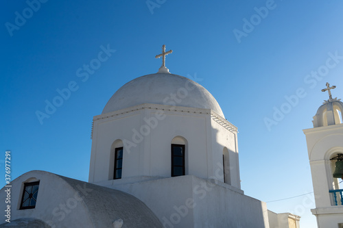 church in the village of megalochori, santorini, cyclades, greece. blue sky