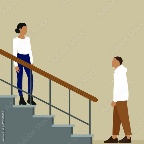 Female character stands on stairs and looks at male character