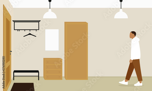 A male character walks down the hallway to the front door