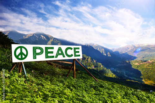 Peace sign mockup visual, on the green mountain