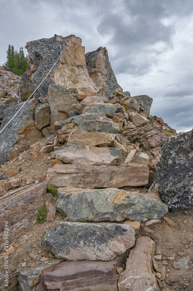 Hiking trail steps on a mountain top above the town of Golden, British Columbia, Canada