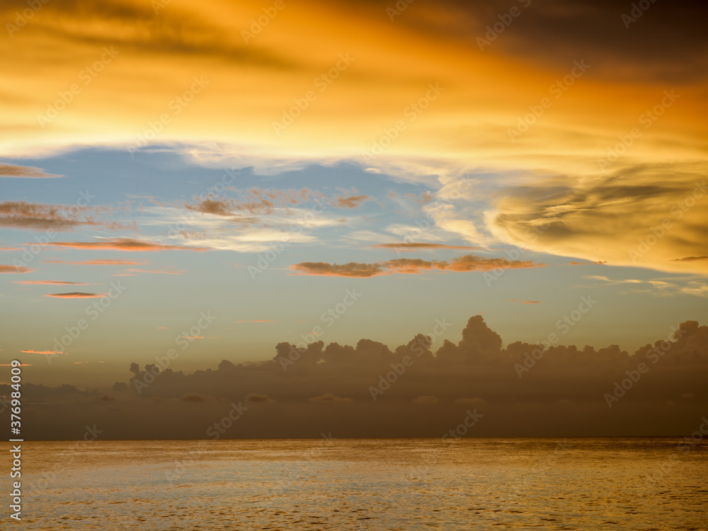 Colorful sunset sky over the Gulf of Mexico from Caspersen Beach in Venice Florida USA