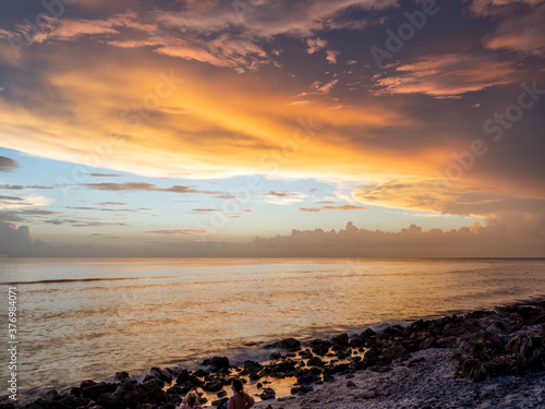 Colorful sunset sky over the Gulf of Mexico from Caspersen Beach in Venice Florida USA © Jim Schwabel