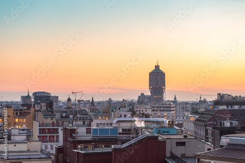 Skyline of Milan with torre Velasca at sunset photo