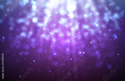 Abstract light background. Spotlight and bokeh effect with purple and blue color.