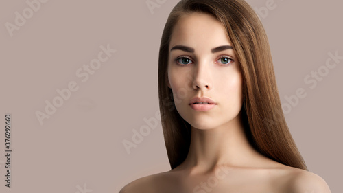 Beautiful young woman with clean perfect skin.