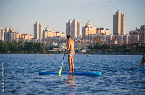 Man on a SUP board in the river