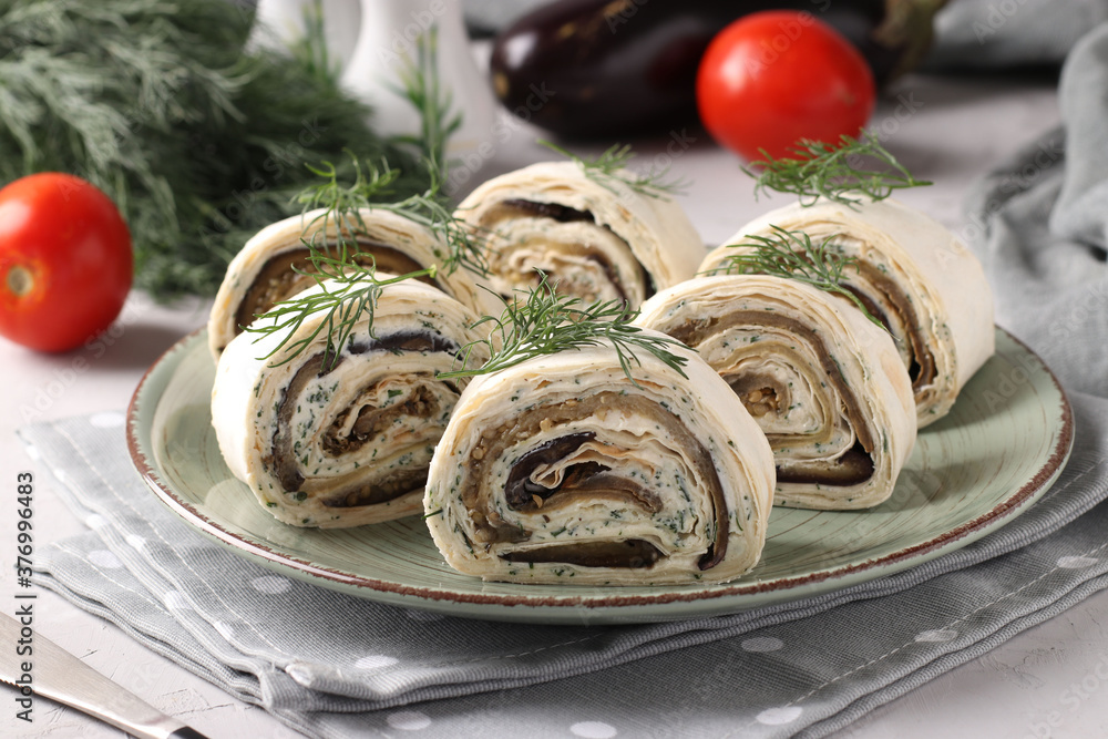 Lavash roll with eggplants, garlic and cream cheese, festive appetizer, Closeup, Horizontal format