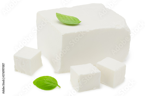 feta cheese with basil isolated on white background. Clipping path and full depth of field
