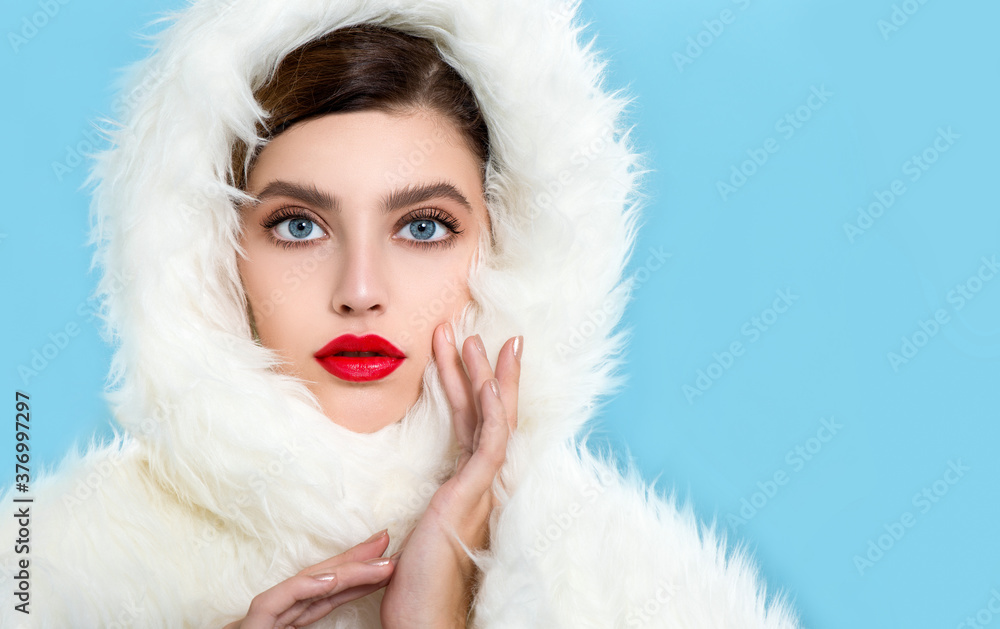 Portrait of beautiful young woman wearing red clothes with perfect young skin, red matt lips and nails. Portrait of beautiful young woman wearing red clothes with perfect young skin, red matt lips and nails.