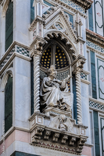 Cathedral Santa Maria del Fiore (or Duomo di Firenze), was built between 1296 and 1436. Cathedral is one of largest in world. Architectural fragments of front facade. Piazza del Duomo, Florence, Italy