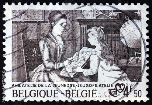 Postage stamp Belgium 1977 Mother and Daughter with Album
