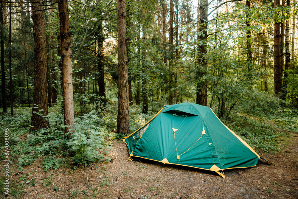 camping and tourist tent in the forest