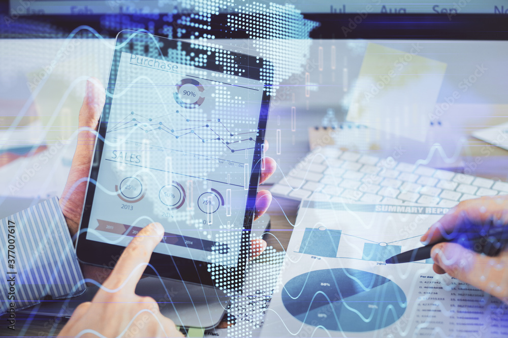 Multi exposure of man's hands holding and using a phone and financial chart drawing. Market analysis concept. Multi exposure of man's hands holding and using a phone and financial chart drawing. Market analysis concept.