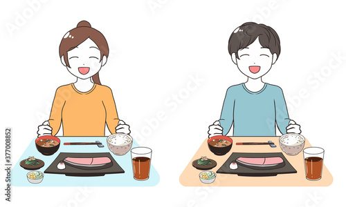 笑顔で食事を行う