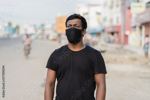 Young Indian Tamil Guy wearing mask during corona pandemic in Chennai, Tamil Nadu, India © Noel