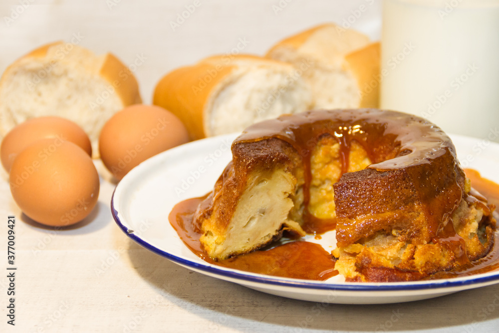 bread pudding made with stale bread, milk, eggs and sugar, decorated