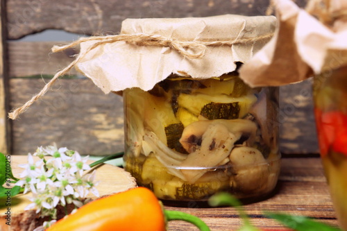 pickled vegetables in a glass jar, homemade vegetables,