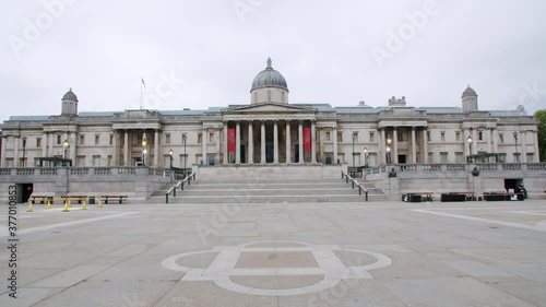 Lockdown in London, Slow motion Gilmbal walk in front of the National Gallery, during coronavirus pandemic 2020, with flying seagull birds.