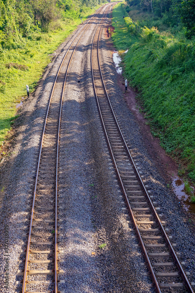 Railway tracks with gravel and iron steel Railway tracks with gravel and iron steel