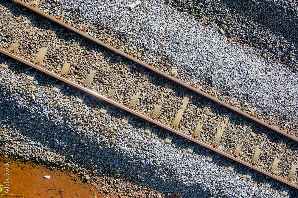Railway tracks with gravel and iron steel 