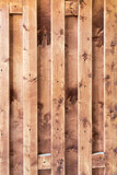 Planks of wood on the wall, background picture of vertical orientation