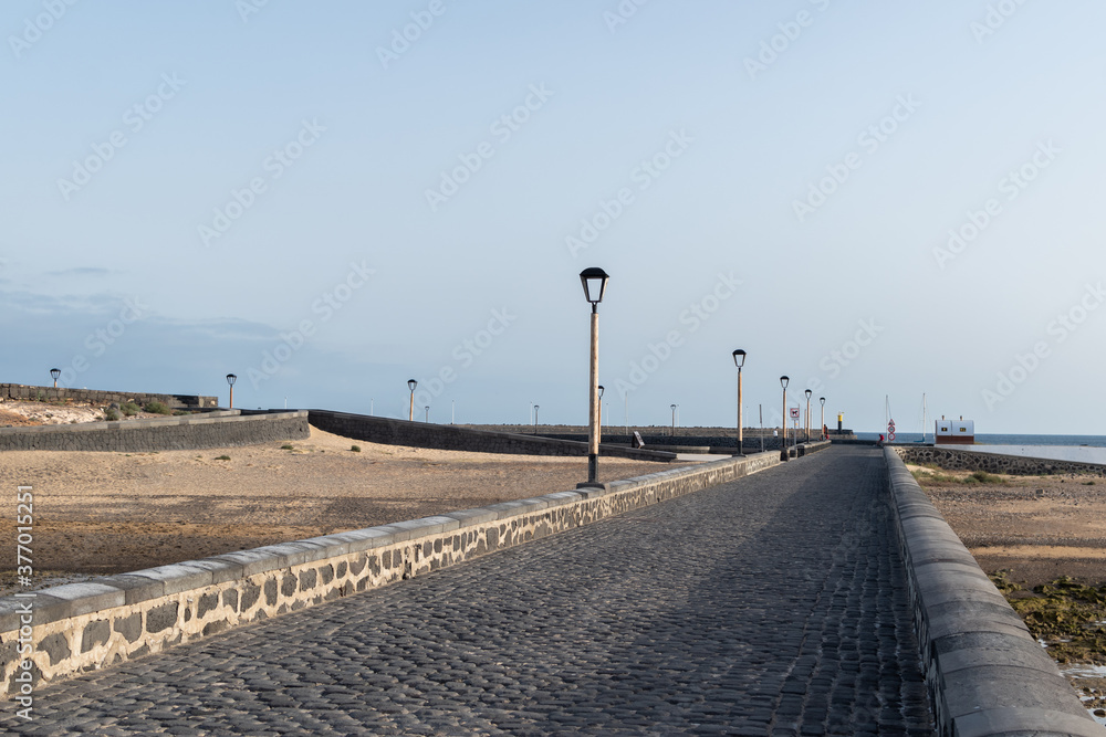Image of the cobbled street towards the Castillo de San Gabriel on the island of Lanzarote