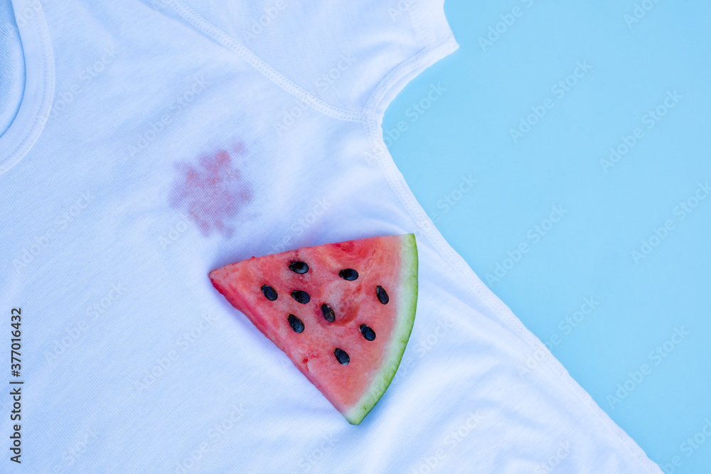 Stain on a white T-shirt from berries Stain on a white T-shirt from berries